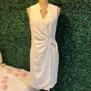 H&M White Wrap around sleeveless dress with attached belt. Size 8, never worn